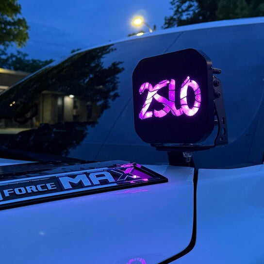 Custom "2SLO" lettering cover glowing purple on a Diode Dynamics SS5 pod light